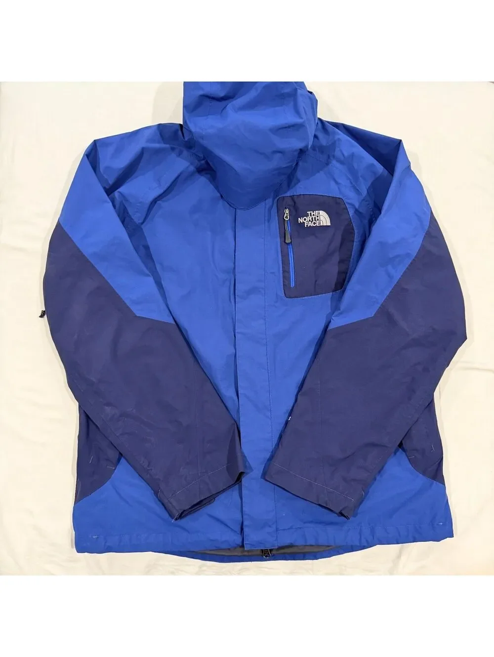 The North Face HyVent hooded waterproof shell jacket, style AFXD, Fall 2010.
